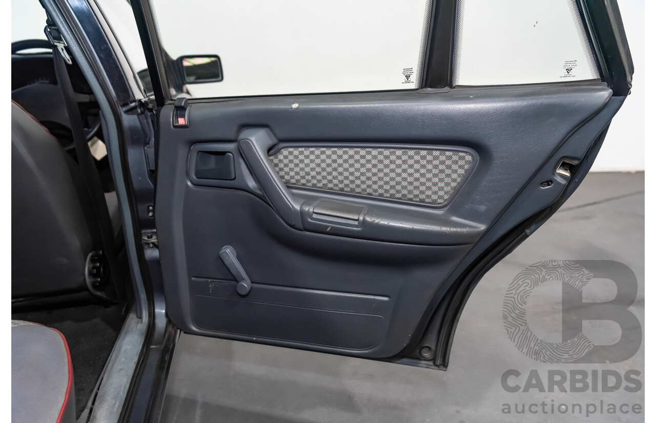 3/1990 Holden Commodore SS VN 4d Sedan A9F Atlas Grey V8 5.0L