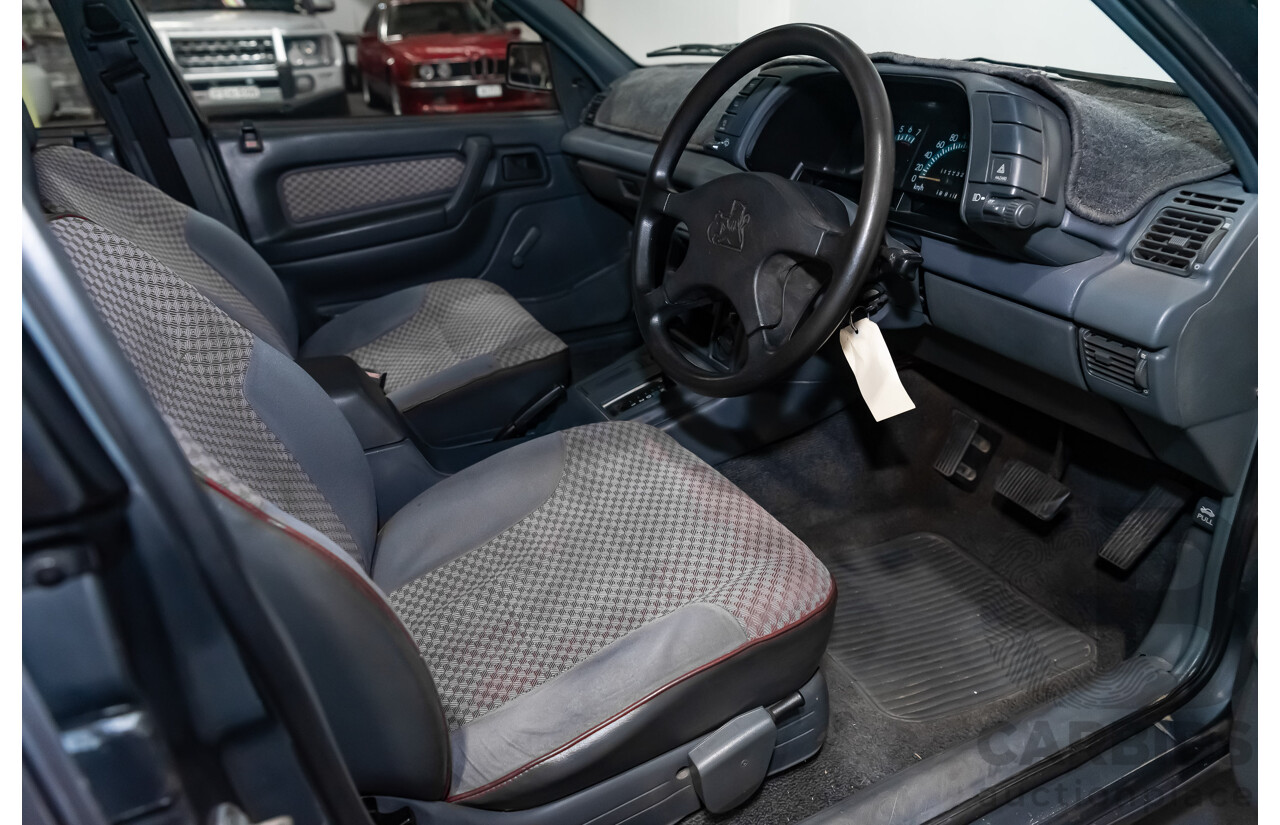 3/1990 Holden Commodore SS VN 4d Sedan A9F Atlas Grey V8 5.0L