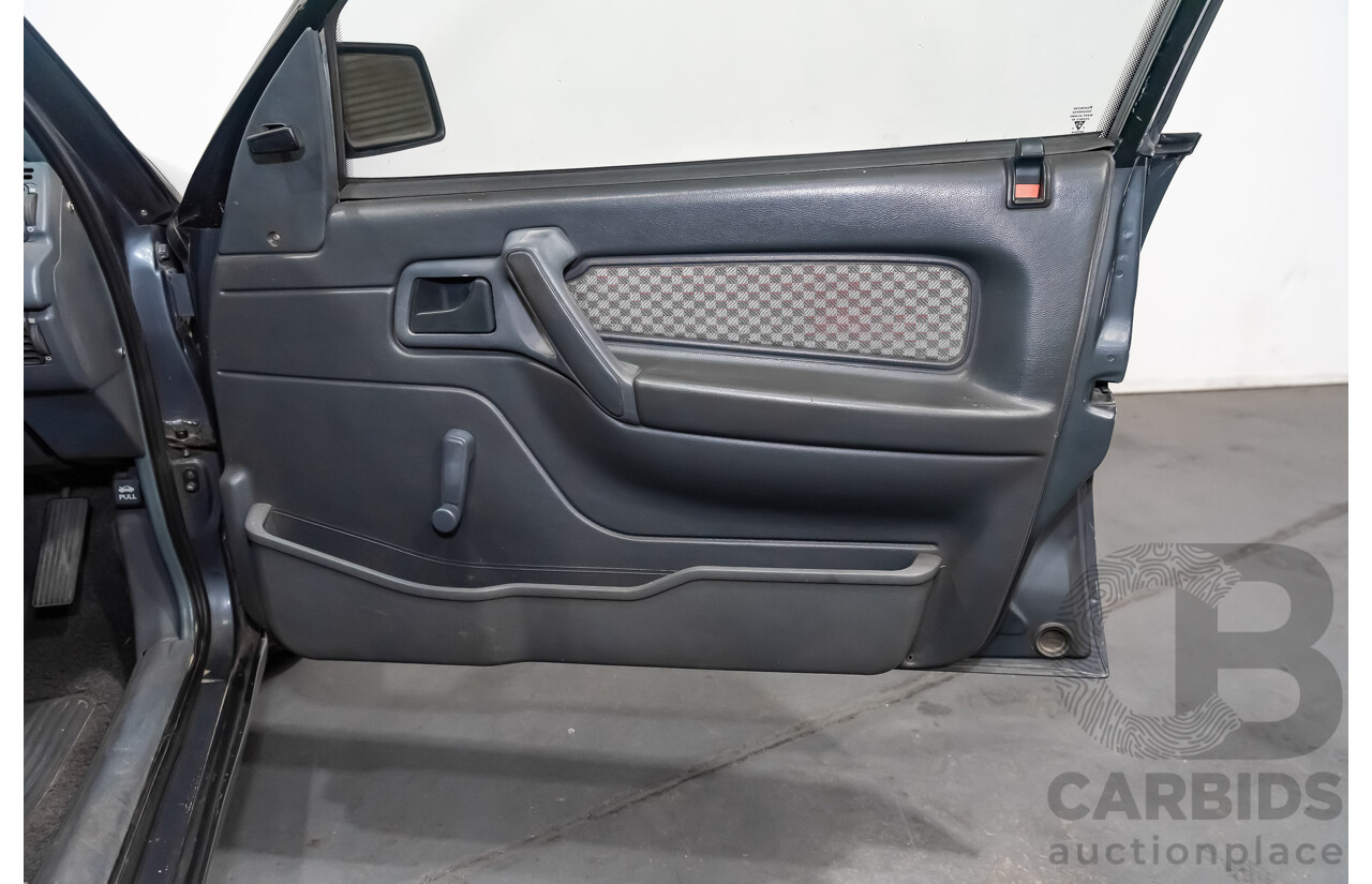 3/1990 Holden Commodore SS VN 4d Sedan A9F Atlas Grey V8 5.0L