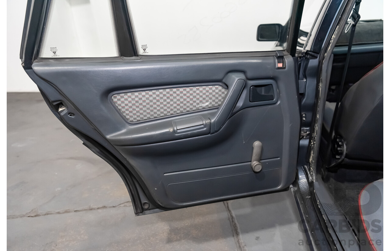 3/1990 Holden Commodore SS VN 4d Sedan A9F Atlas Grey V8 5.0L