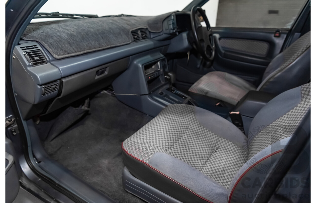 3/1990 Holden Commodore SS VN 4d Sedan A9F Atlas Grey V8 5.0L