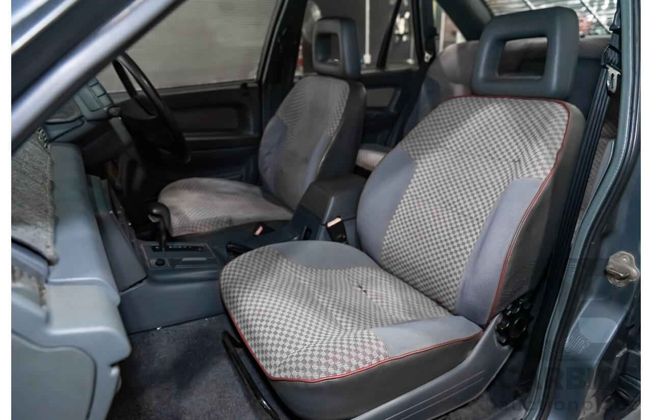 3/1990 Holden Commodore SS VN 4d Sedan A9F Atlas Grey V8 5.0L