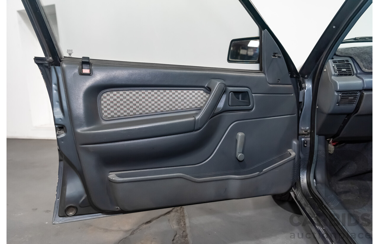 3/1990 Holden Commodore SS VN 4d Sedan A9F Atlas Grey V8 5.0L