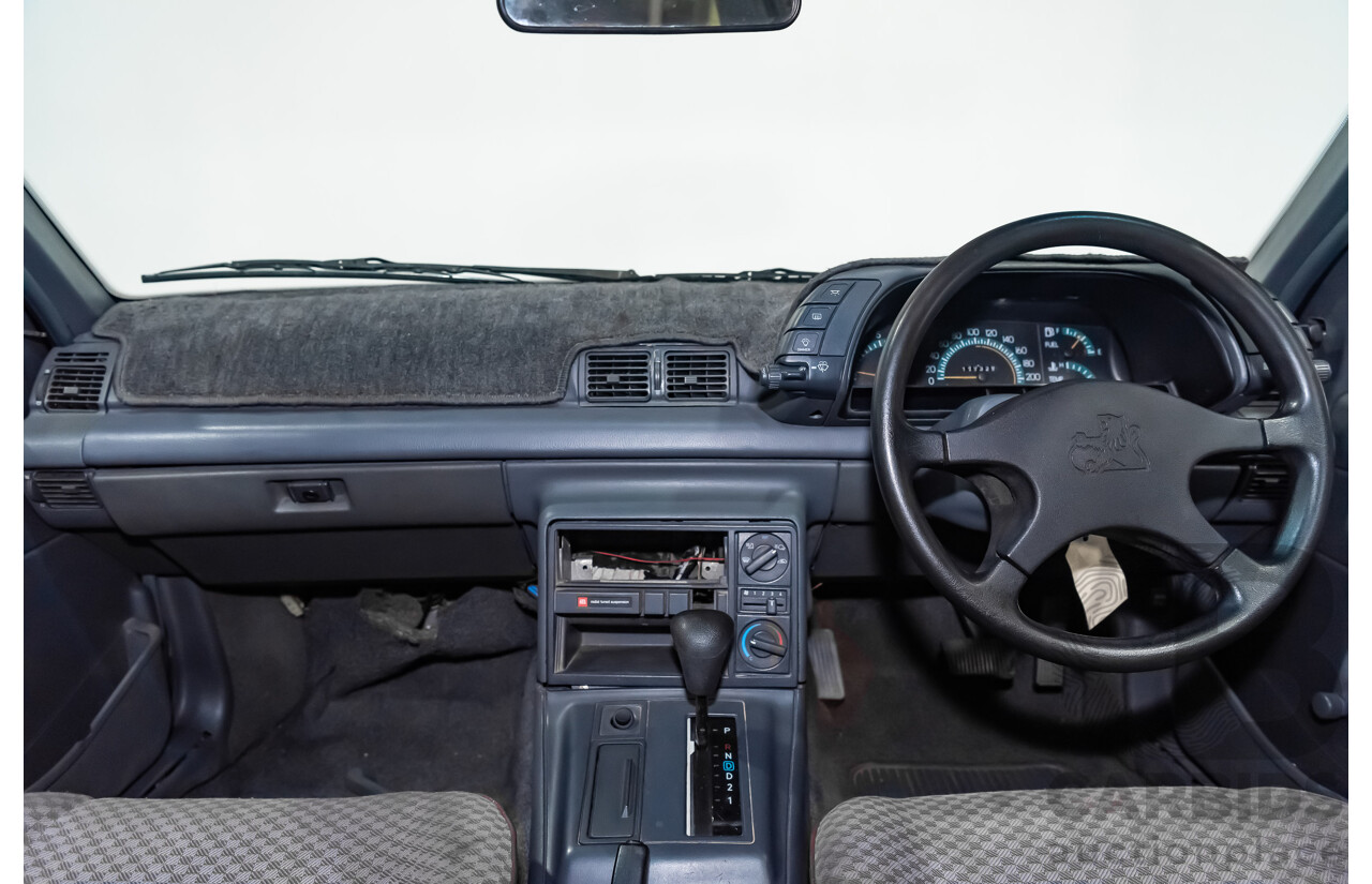 3/1990 Holden Commodore SS VN 4d Sedan A9F Atlas Grey V8 5.0L