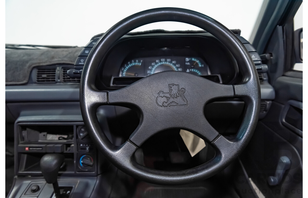 3/1990 Holden Commodore SS VN 4d Sedan A9F Atlas Grey V8 5.0L