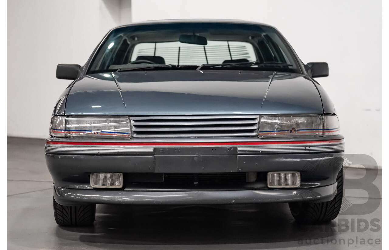 3/1990 Holden Commodore SS VN 4d Sedan A9F Atlas Grey V8 5.0L