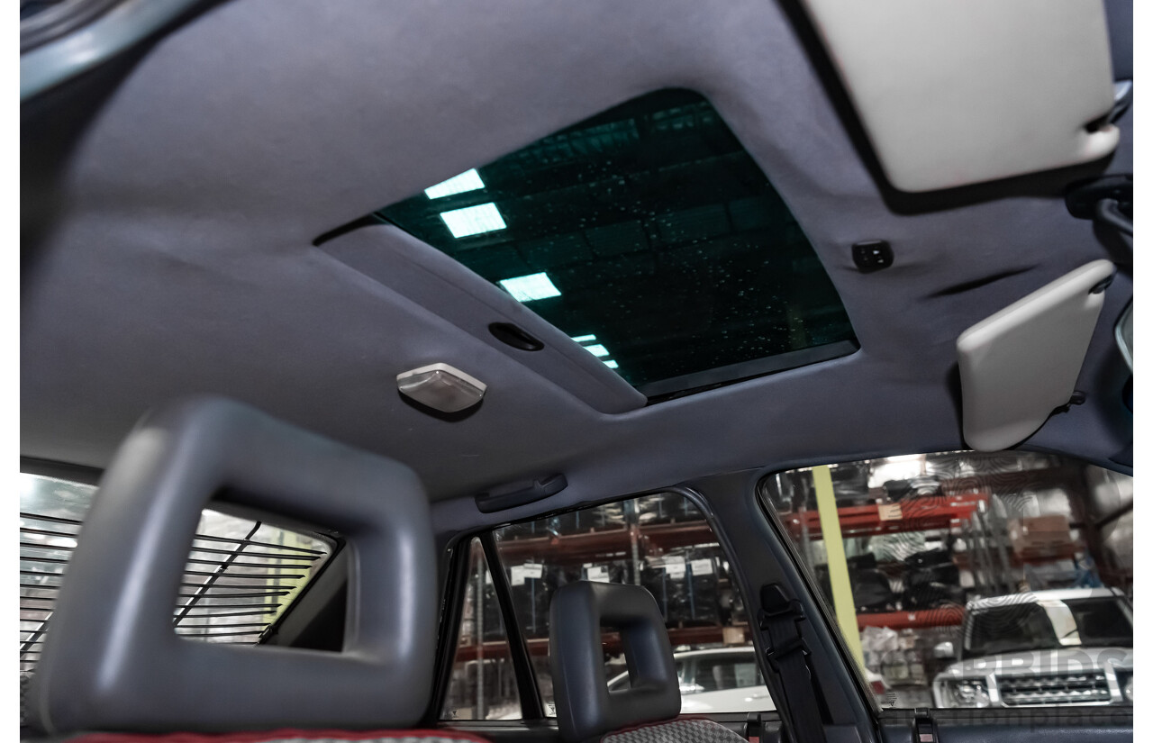 3/1990 Holden Commodore SS VN 4d Sedan A9F Atlas Grey V8 5.0L