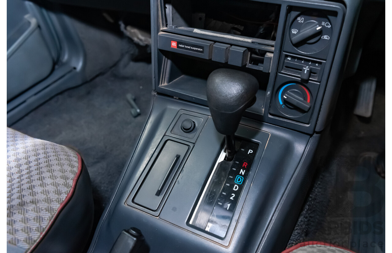 3/1990 Holden Commodore SS VN 4d Sedan A9F Atlas Grey V8 5.0L