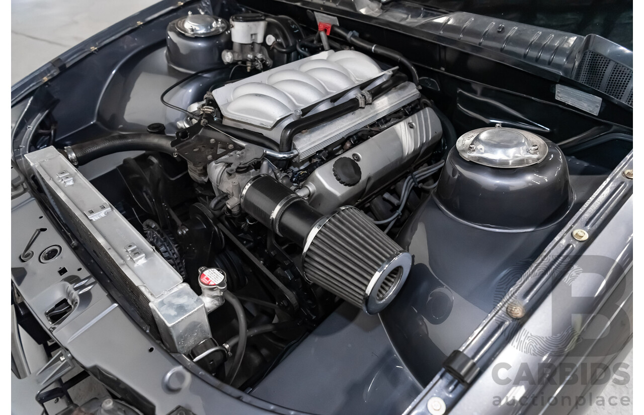 3/1990 Holden Commodore SS VN 4d Sedan A9F Atlas Grey V8 5.0L