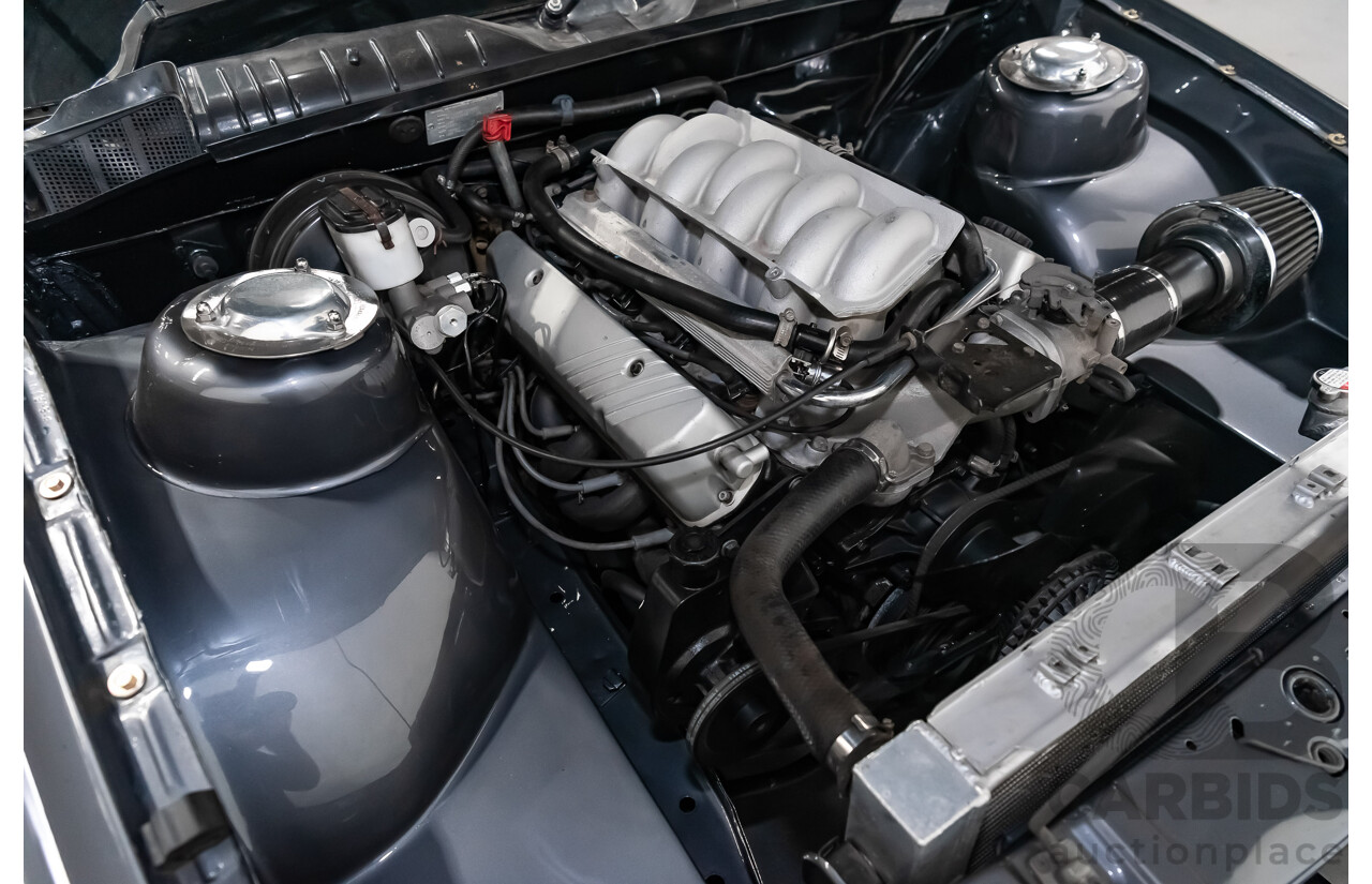 3/1990 Holden Commodore SS VN 4d Sedan A9F Atlas Grey V8 5.0L