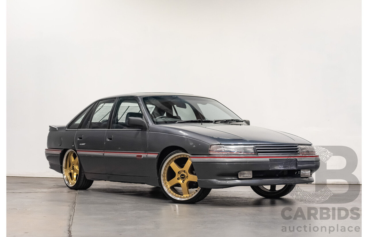 3/1990 Holden Commodore SS VN 4d Sedan A9F Atlas Grey V8 5.0L