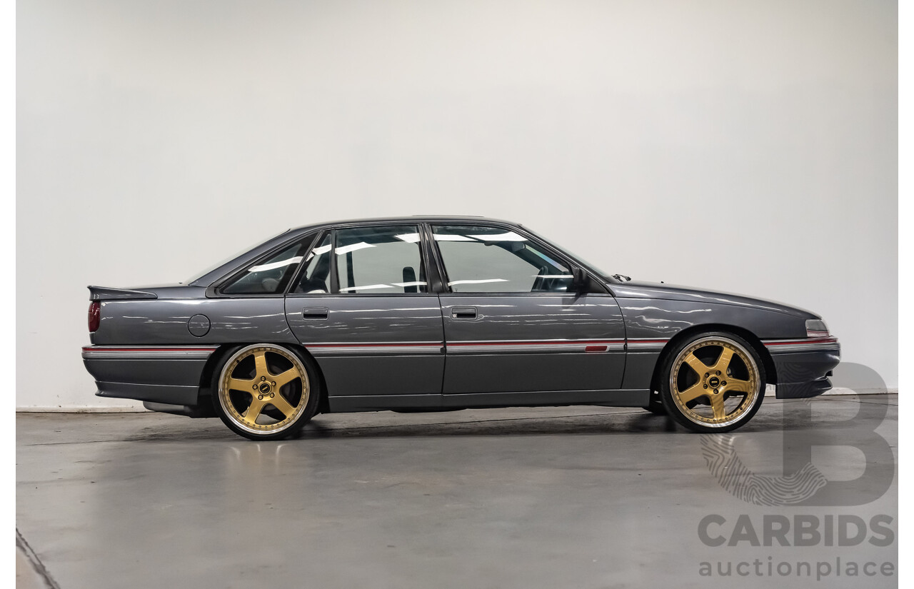 3/1990 Holden Commodore SS VN 4d Sedan A9F Atlas Grey V8 5.0L