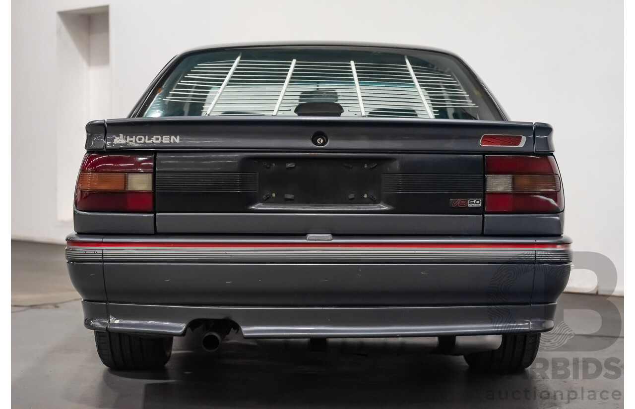 3/1990 Holden Commodore SS VN 4d Sedan A9F Atlas Grey V8 5.0L