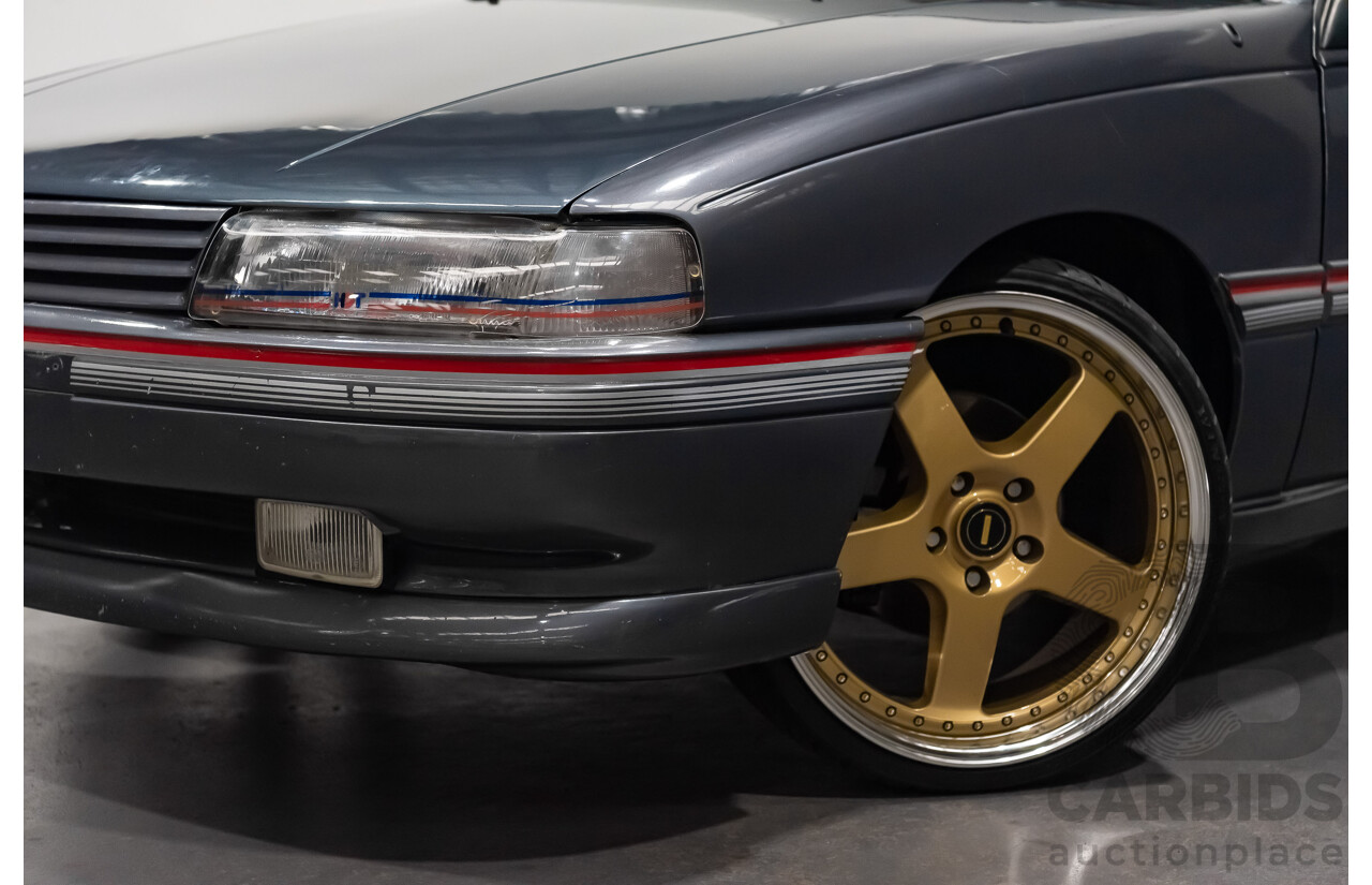 3/1990 Holden Commodore SS VN 4d Sedan A9F Atlas Grey V8 5.0L