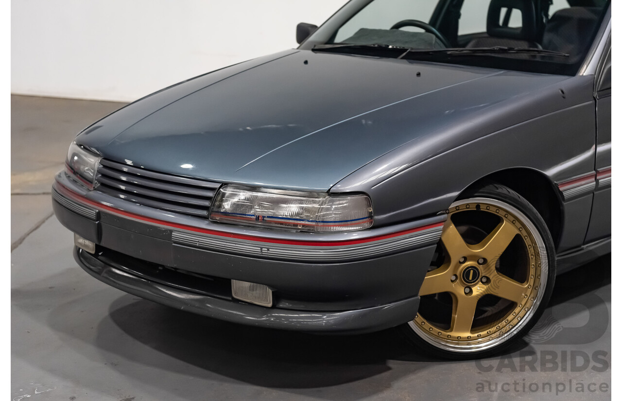 3/1990 Holden Commodore SS VN 4d Sedan A9F Atlas Grey V8 5.0L