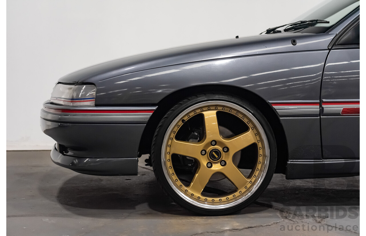 3/1990 Holden Commodore SS VN 4d Sedan A9F Atlas Grey V8 5.0L