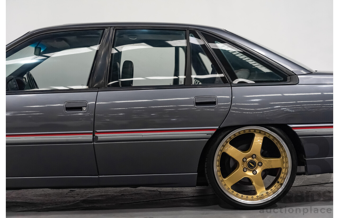 3/1990 Holden Commodore SS VN 4d Sedan A9F Atlas Grey V8 5.0L