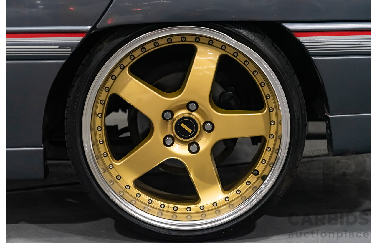 3/1990 Holden Commodore SS VN 4d Sedan A9F Atlas Grey V8 5.0L