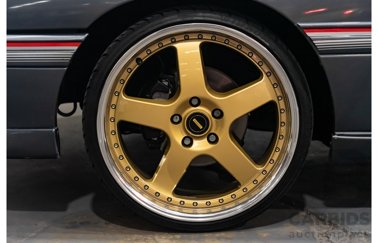 3/1990 Holden Commodore SS VN 4d Sedan A9F Atlas Grey V8 5.0L