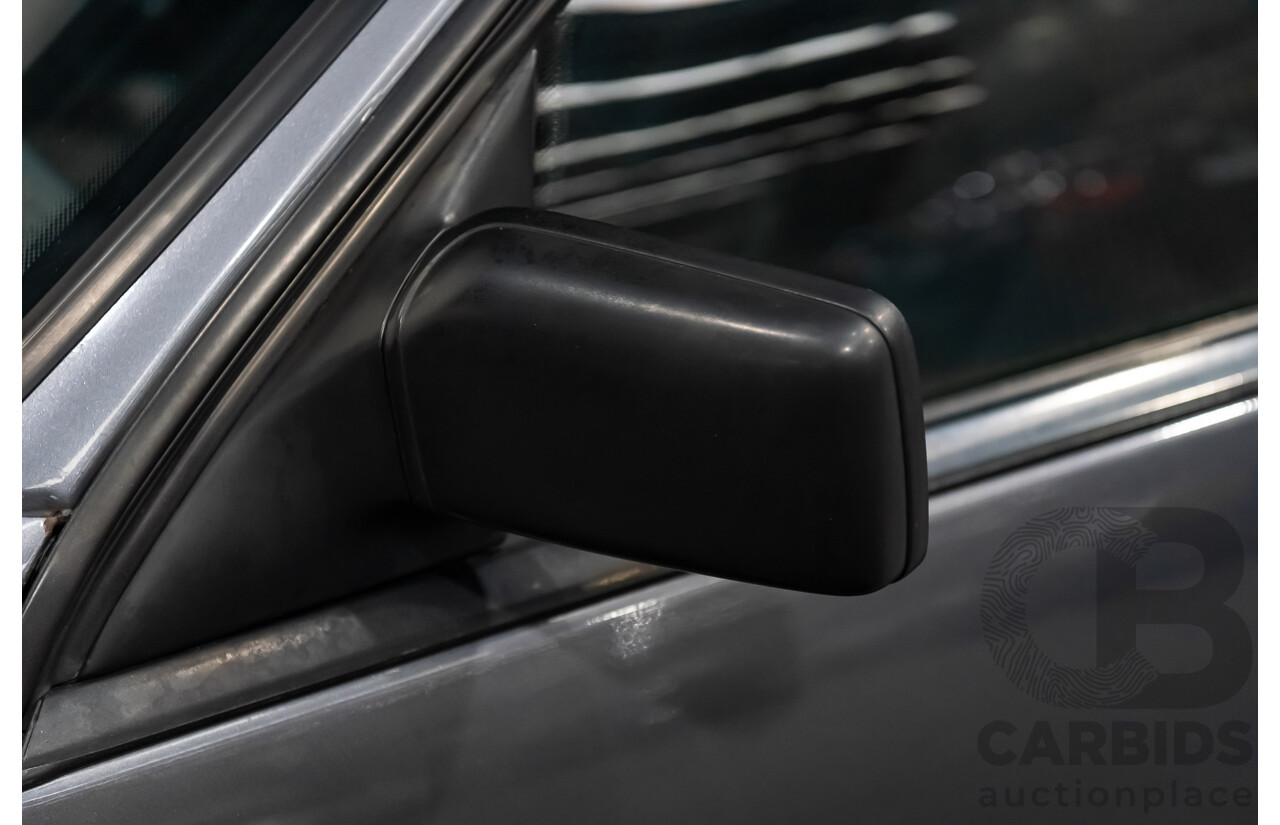 3/1990 Holden Commodore SS VN 4d Sedan A9F Atlas Grey V8 5.0L