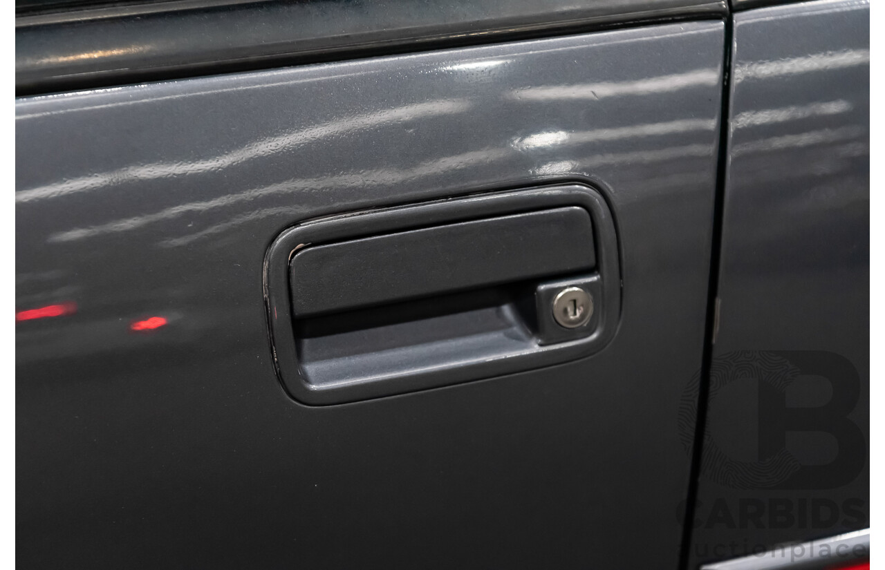 3/1990 Holden Commodore SS VN 4d Sedan A9F Atlas Grey V8 5.0L