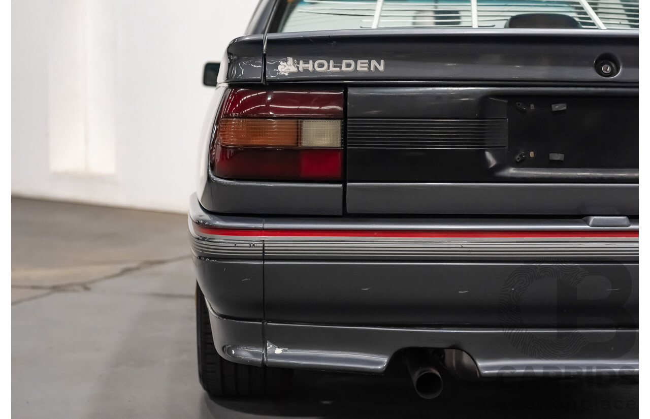3/1990 Holden Commodore SS VN 4d Sedan A9F Atlas Grey V8 5.0L