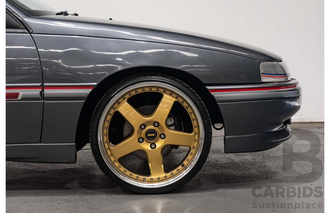 3/1990 Holden Commodore SS VN 4d Sedan A9F Atlas Grey V8 5.0L