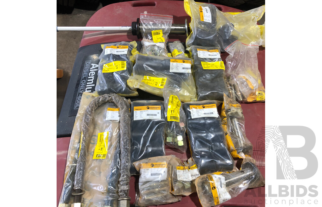 Approximatley 15 Various Truck Spare Parts From Mansons, Including but Not Limited to; U Bolt Assemblies, Wheel Studs, Equaliser Bush And More