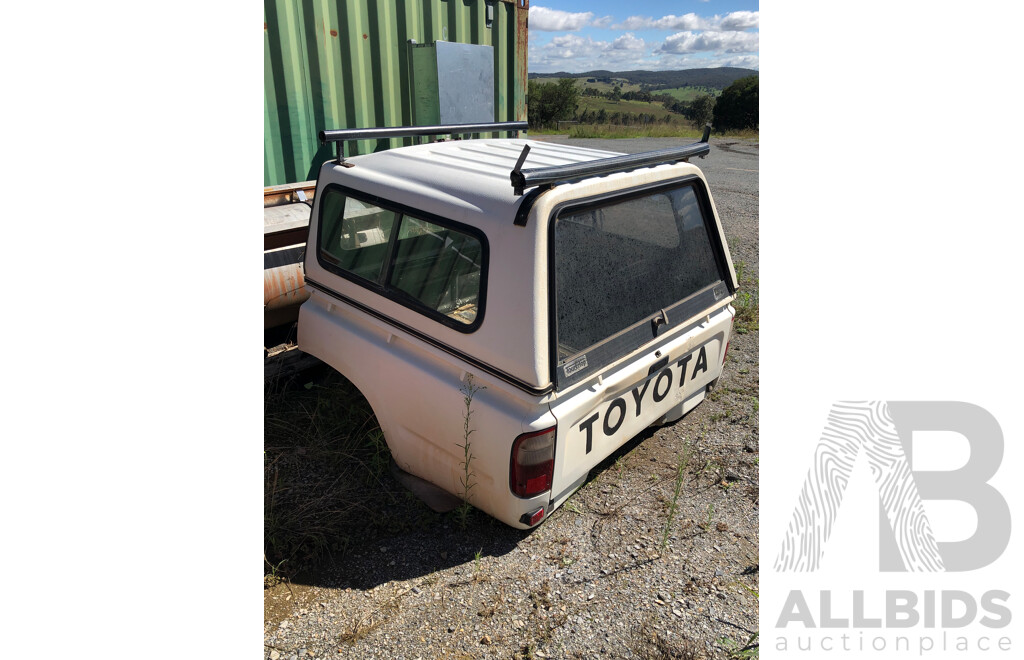 Toyota Hilux Rear End with Canopy and Roof Racks Attached