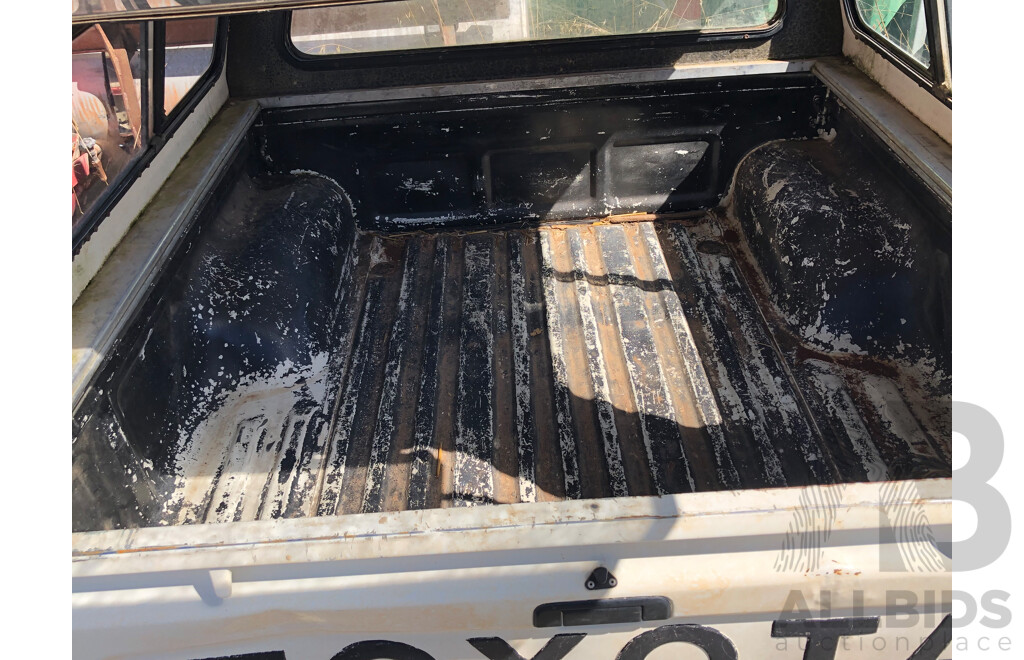 Toyota Hilux Rear End with Canopy and Roof Racks Attached