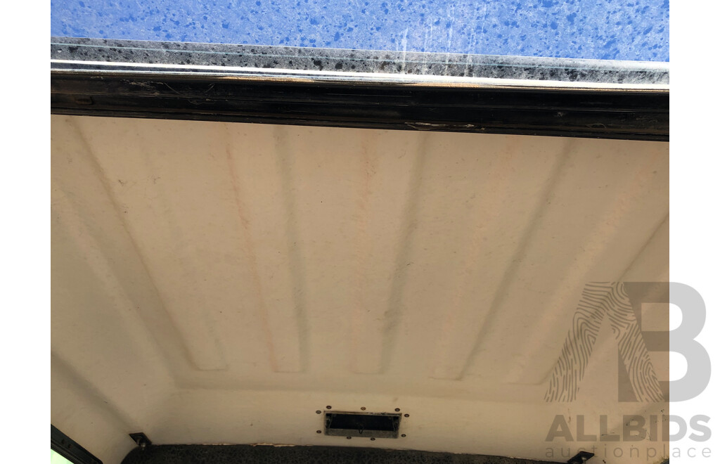 Toyota Hilux Rear End with Canopy and Roof Racks Attached