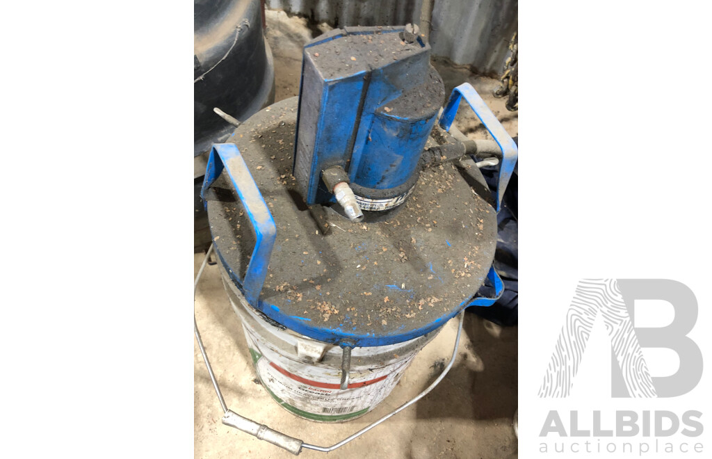 Empty Caltex Premium Heavy Duty Grease with Macnaught Pneumatic Grease Gun