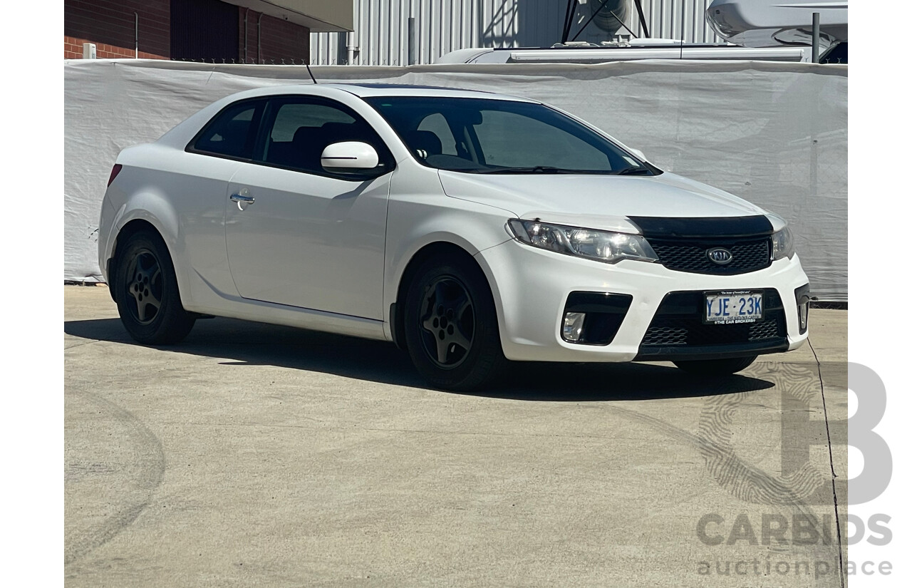 11/12 Kia Cerato KOUP SLS FWD TD MY13 2D Coupe White 2.0L