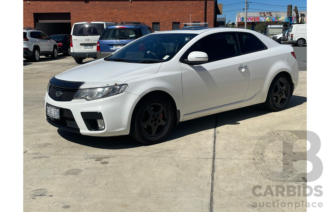 11/12 Kia Cerato KOUP SLS FWD TD MY13 2D Coupe White 2.0L