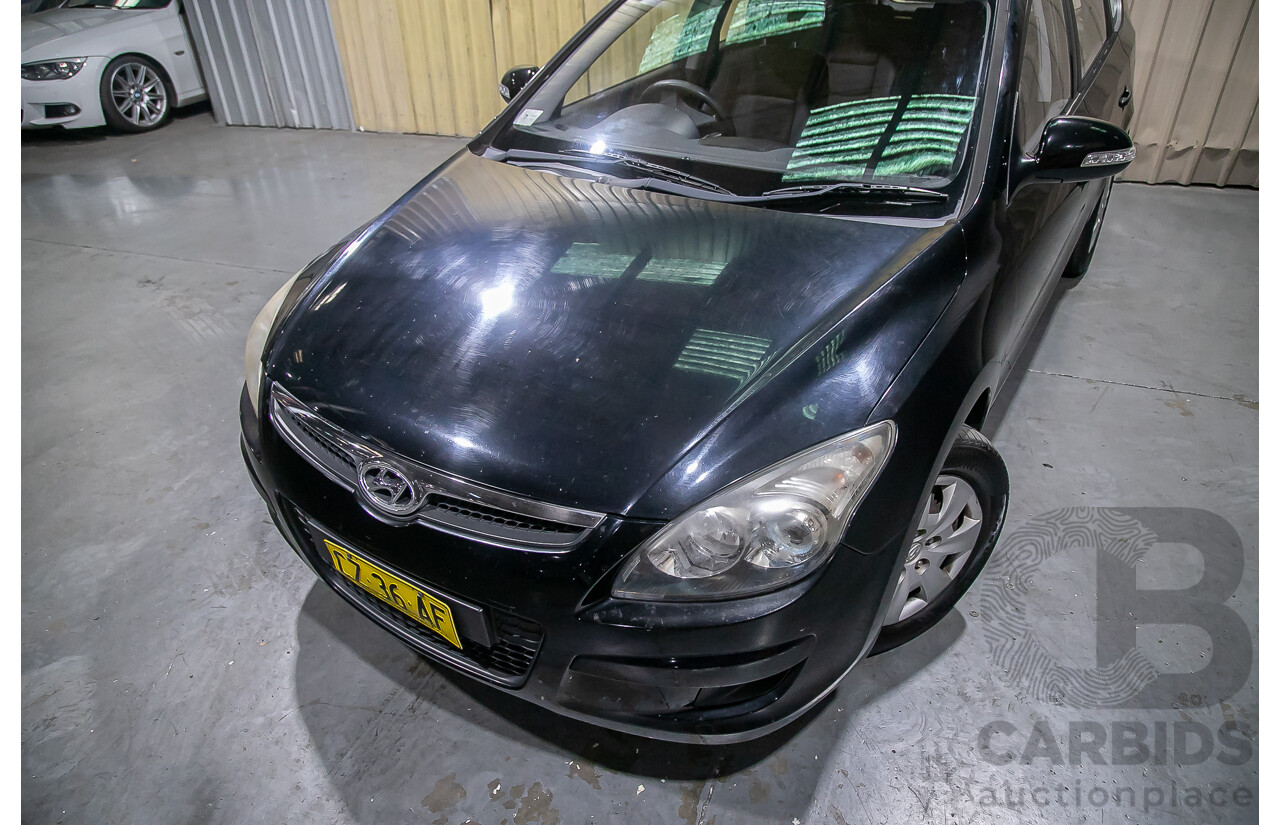06/12 Hyundai I30 cw SX 2.0 FWD FD MY12 4D Wagon Black 2.0L