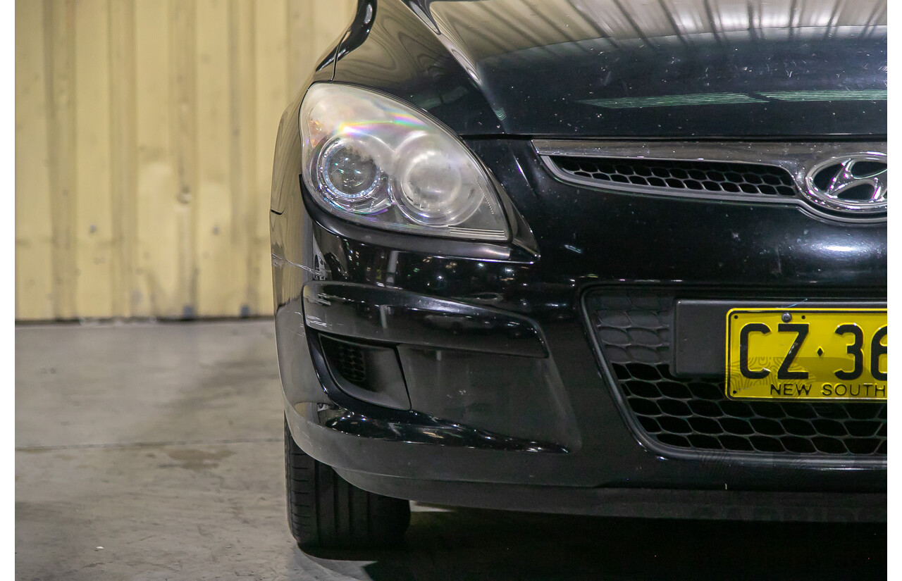 06/12 Hyundai I30 cw SX 2.0 FWD FD MY12 4D Wagon Black 2.0L