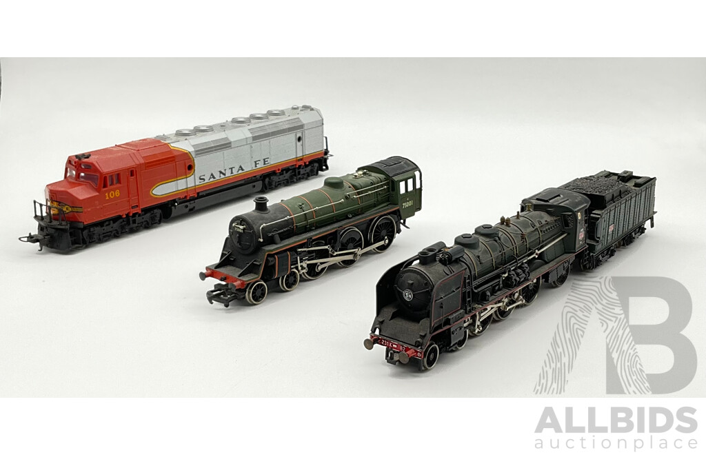 Three HO Scale Locomotives Including Steam Locomotives SCNF 231.2.82, Mainline 75001 and Lima Santa Fe Diesel Locomotive 106