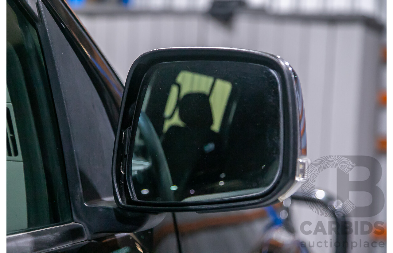 1/2012 Nissan Navara ST-X 550 (4x4) D40 MY12 Dual Cab Utility Black Turbo Diesel V6 3.0L