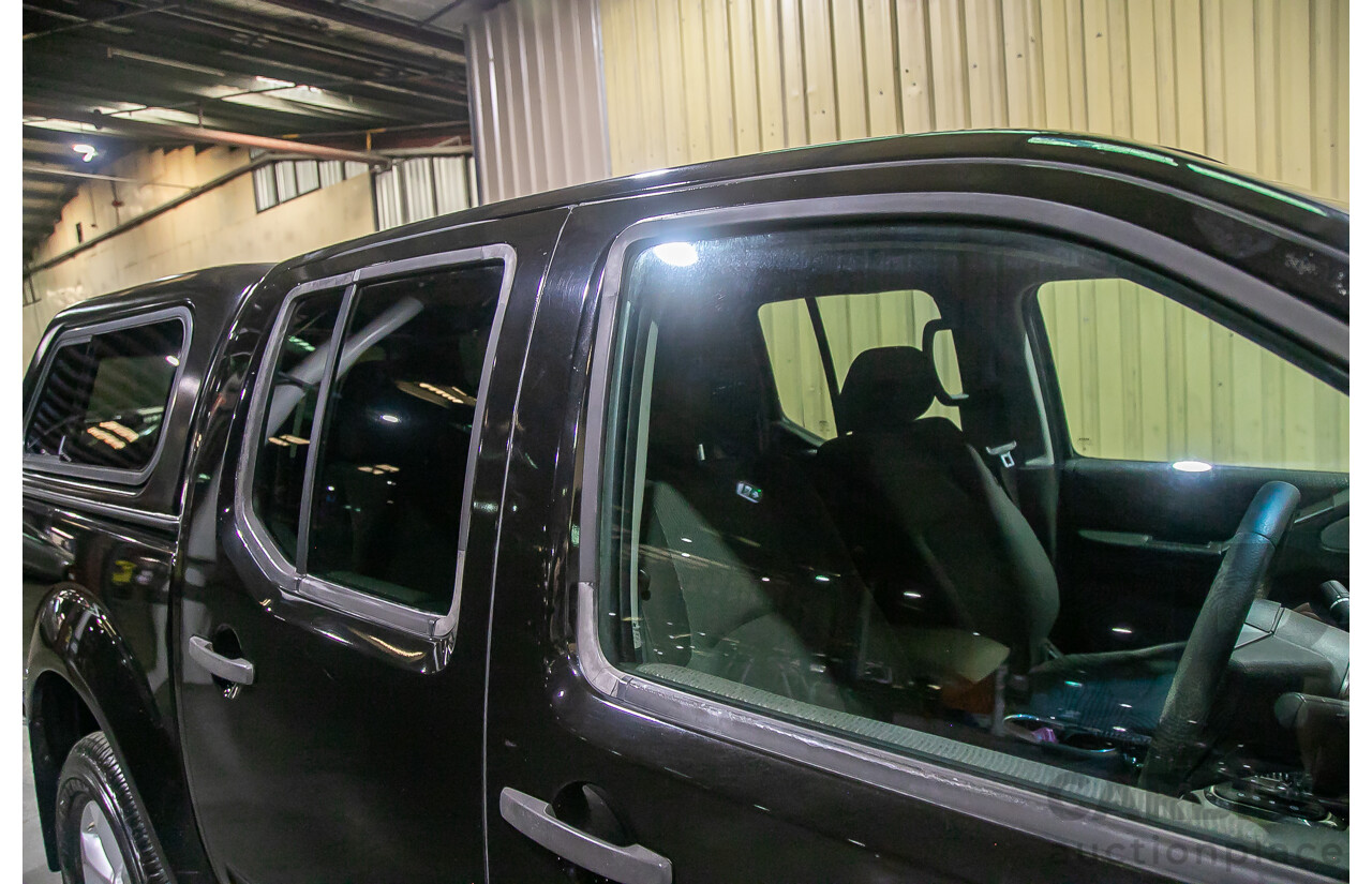 1/2012 Nissan Navara ST-X 550 (4x4) D40 MY12 Dual Cab Utility Black Turbo Diesel V6 3.0L