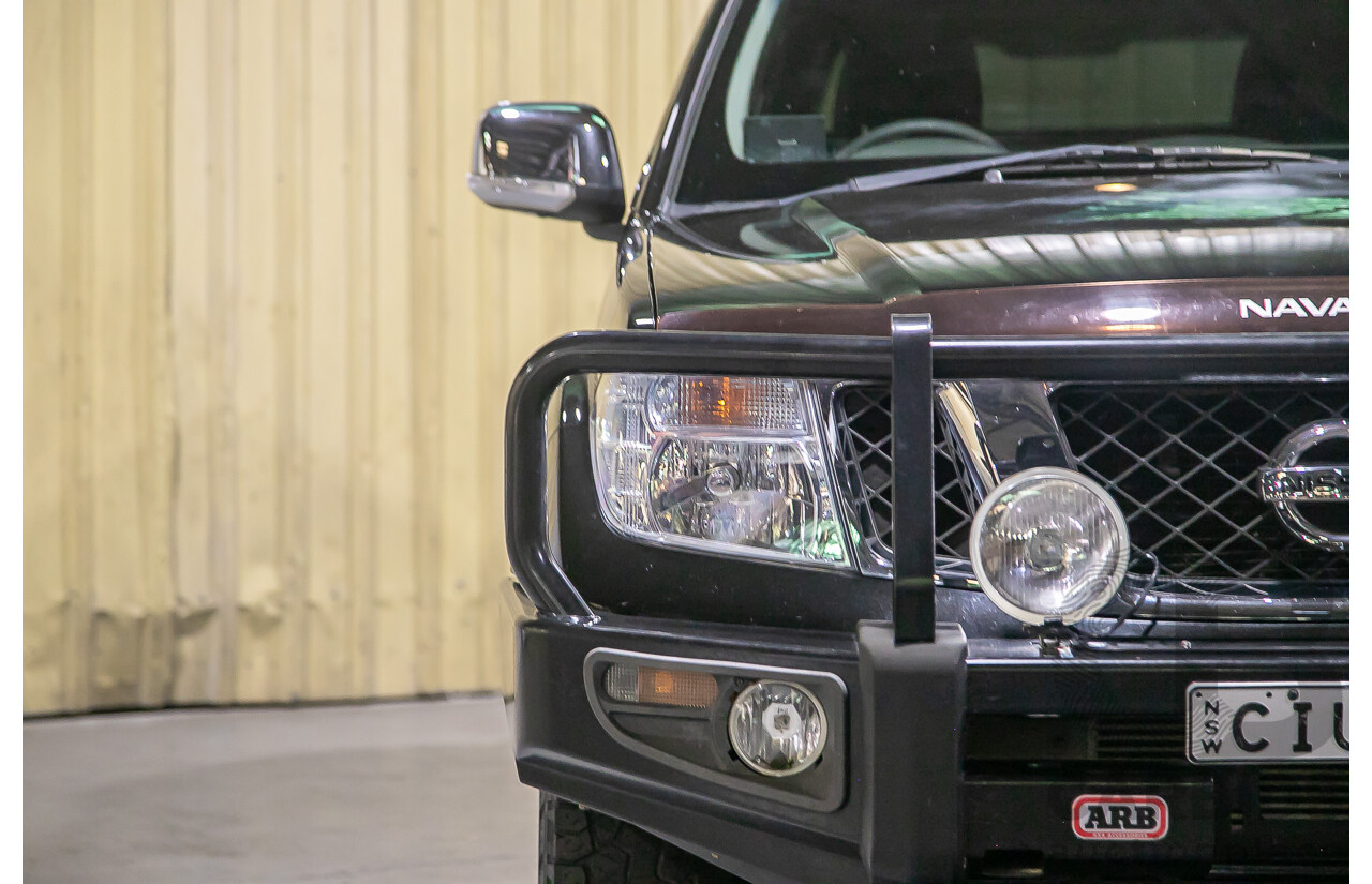 1/2012 Nissan Navara ST-X 550 (4x4) D40 MY12 Dual Cab Utility Black Turbo Diesel V6 3.0L