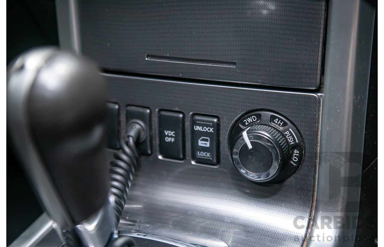 1/2012 Nissan Navara ST-X 550 (4x4) D40 MY12 Dual Cab Utility Black Turbo Diesel V6 3.0L