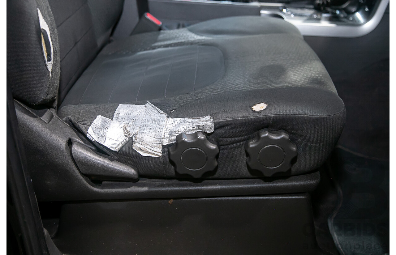 1/2012 Nissan Navara ST-X 550 (4x4) D40 MY12 Dual Cab Utility Black Turbo Diesel V6 3.0L