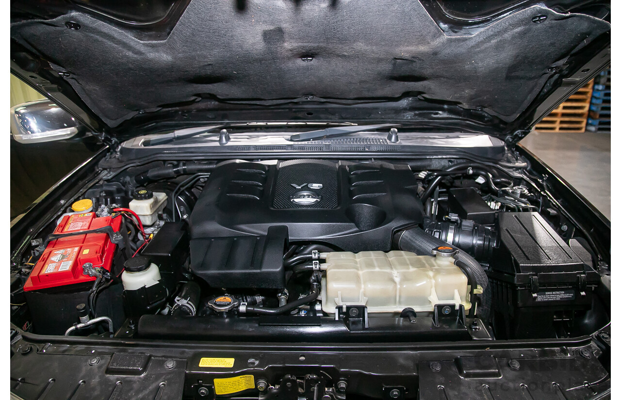 1/2012 Nissan Navara ST-X 550 (4x4) D40 MY12 Dual Cab Utility Black Turbo Diesel V6 3.0L