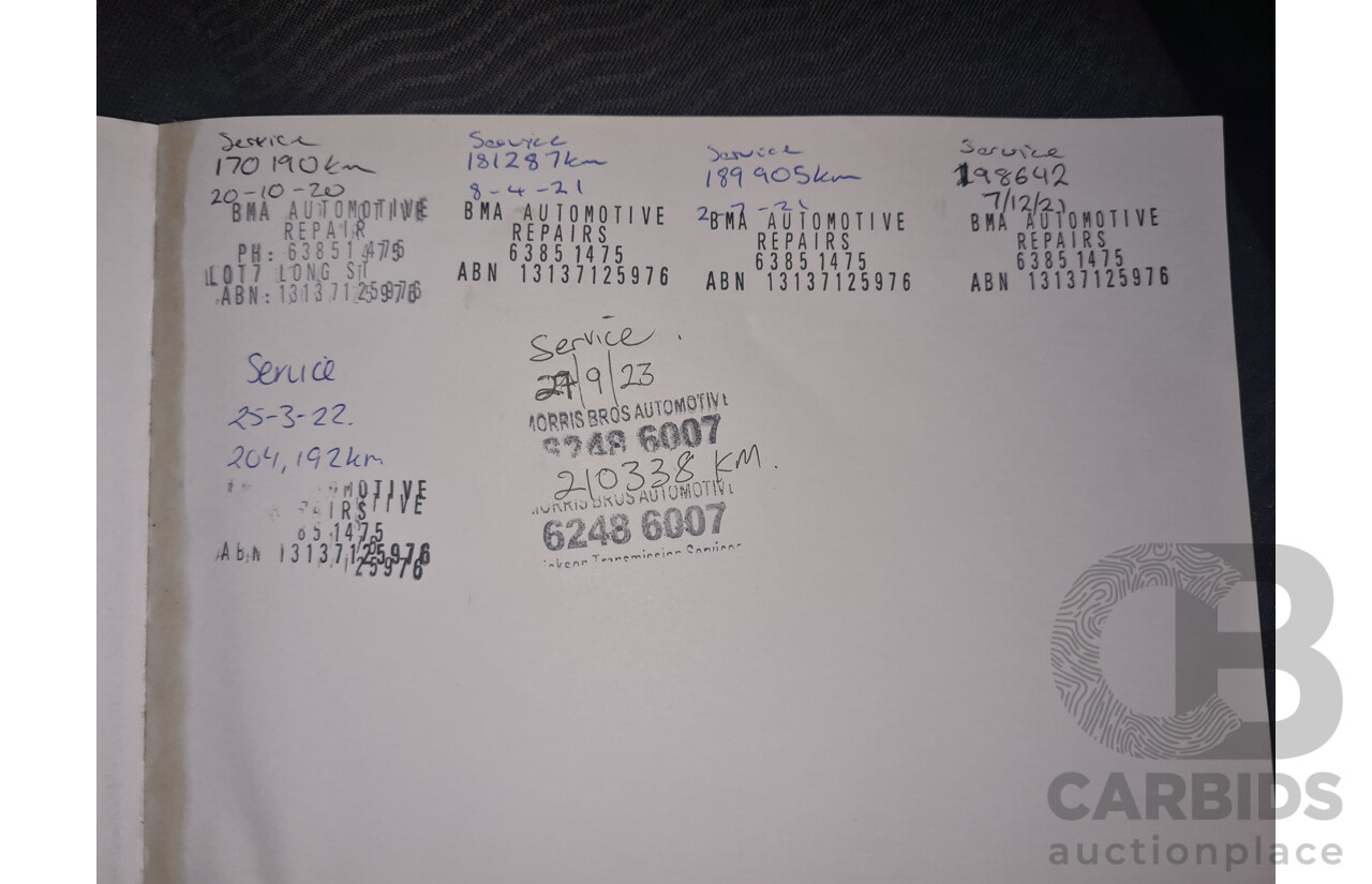 1/2012 Nissan Navara ST-X 550 (4x4) D40 MY12 Dual Cab Utility Black Turbo Diesel V6 3.0L