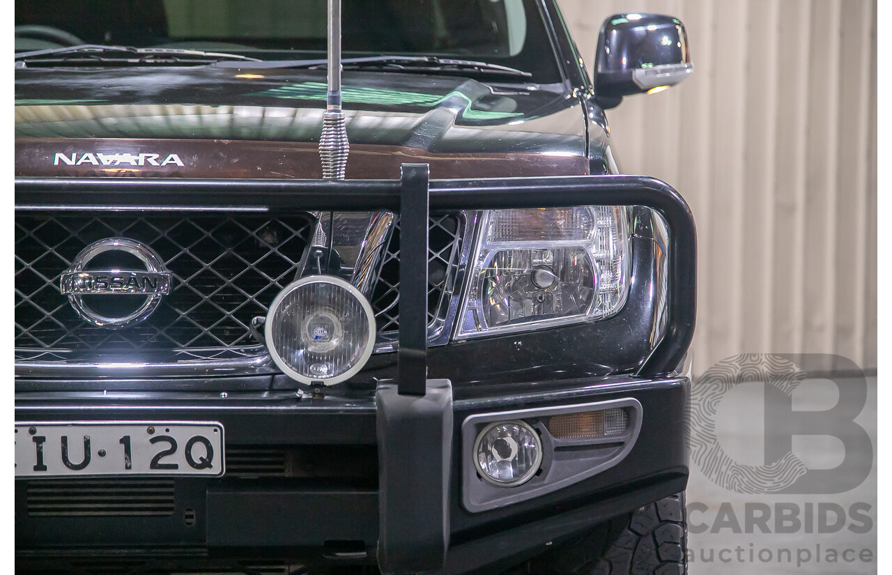 1/2012 Nissan Navara ST-X 550 (4x4) D40 MY12 Dual Cab Utility Black Turbo Diesel V6 3.0L