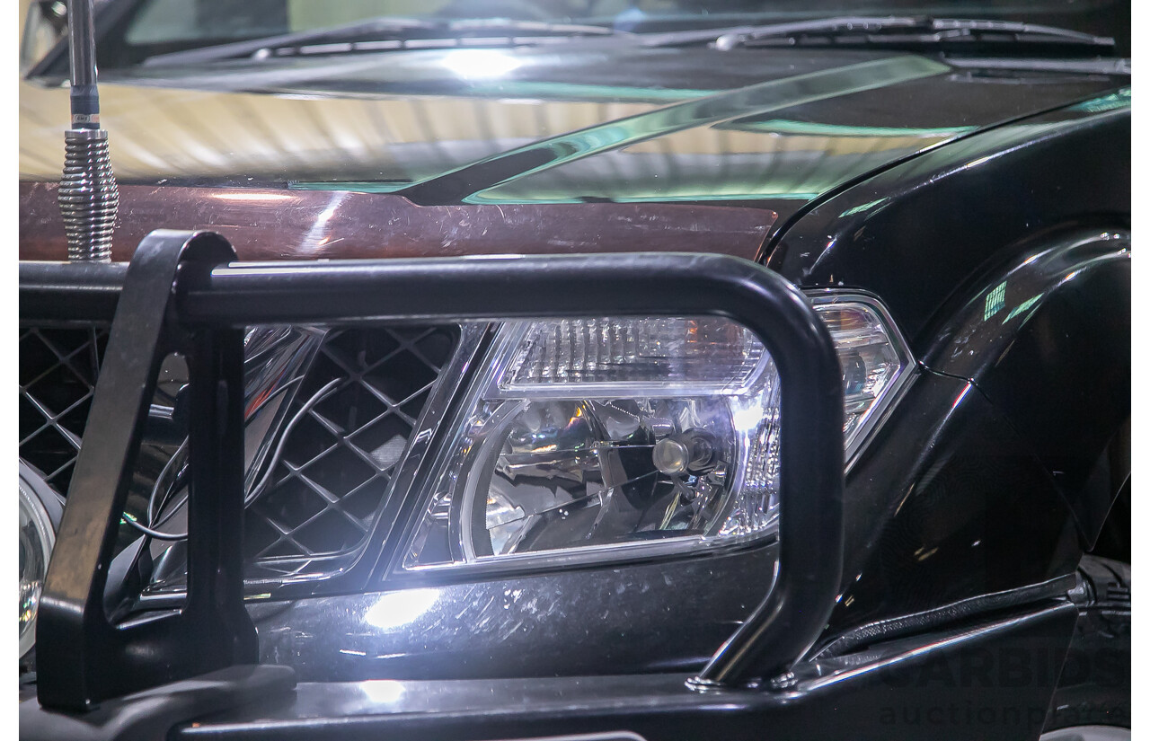 1/2012 Nissan Navara ST-X 550 (4x4) D40 MY12 Dual Cab Utility Black Turbo Diesel V6 3.0L