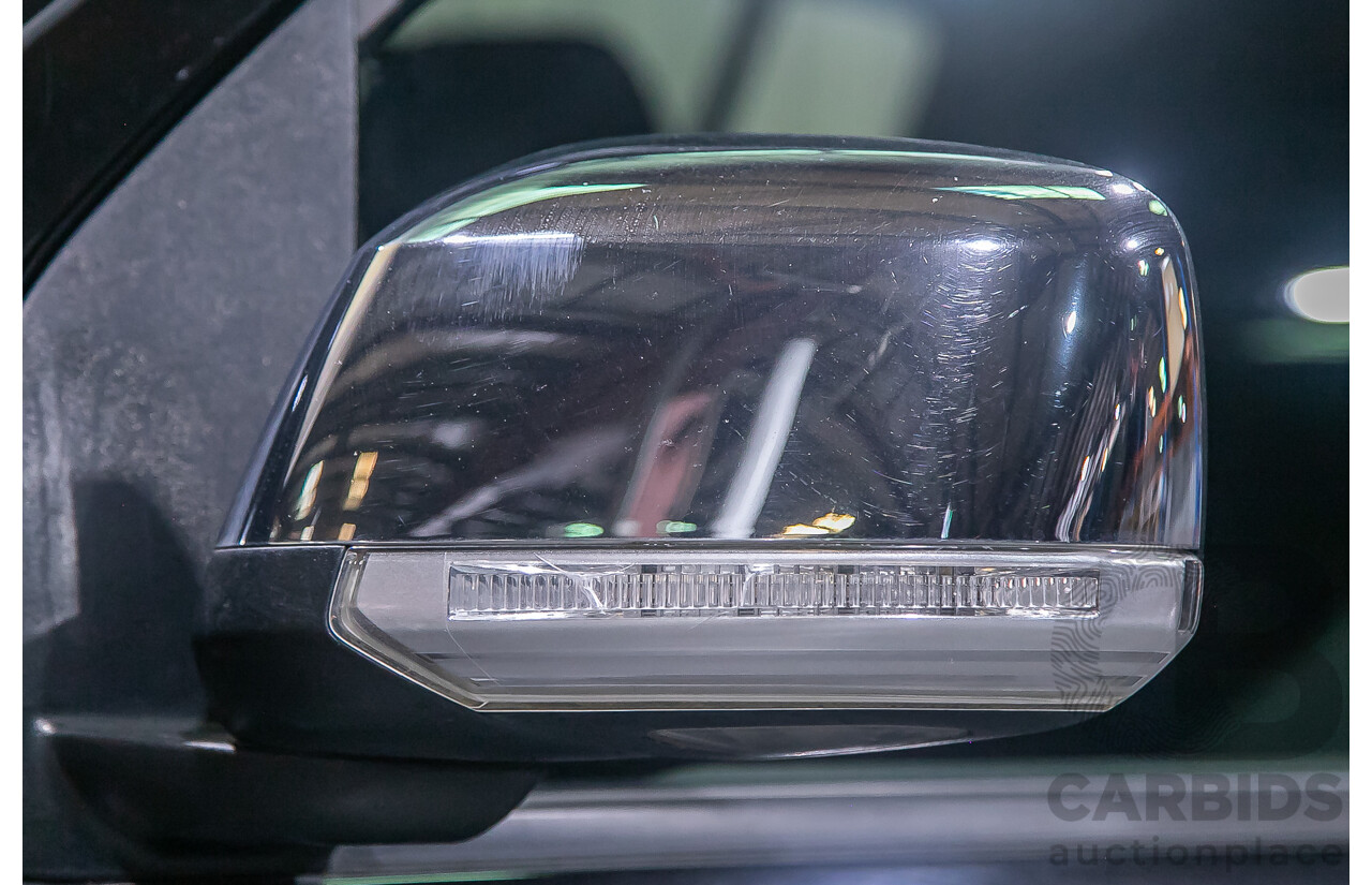 1/2012 Nissan Navara ST-X 550 (4x4) D40 MY12 Dual Cab Utility Black Turbo Diesel V6 3.0L