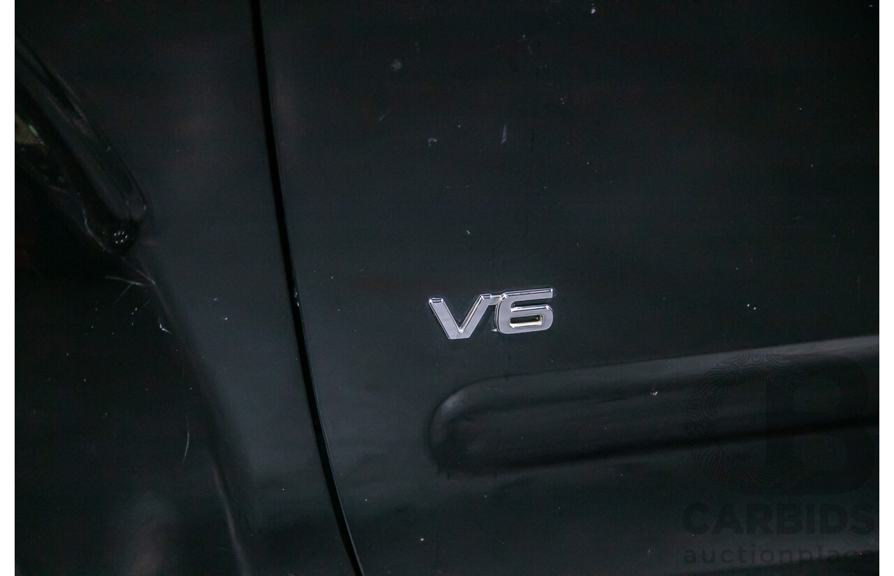 1/2012 Nissan Navara ST-X 550 (4x4) D40 MY12 Dual Cab Utility Black Turbo Diesel V6 3.0L