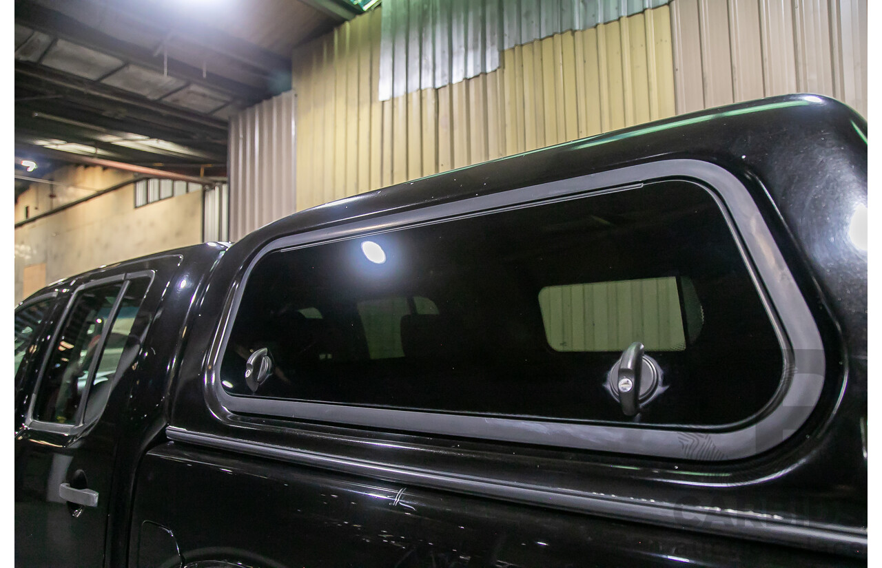 1/2012 Nissan Navara ST-X 550 (4x4) D40 MY12 Dual Cab Utility Black Turbo Diesel V6 3.0L