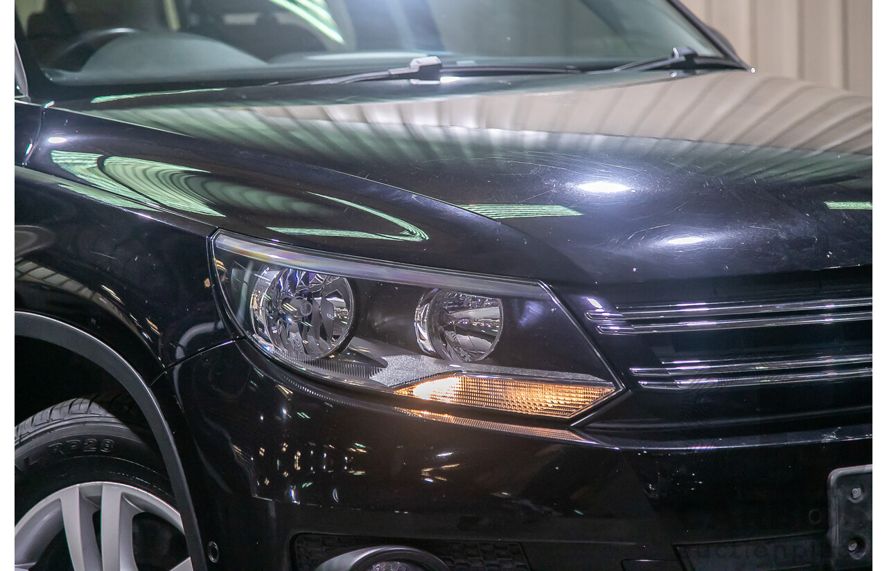 3/2012 Volkswagen Tiguan 132 TSI Pacific (AWD) 5NC MY12 4d Wagon Black Turbo 2.0L